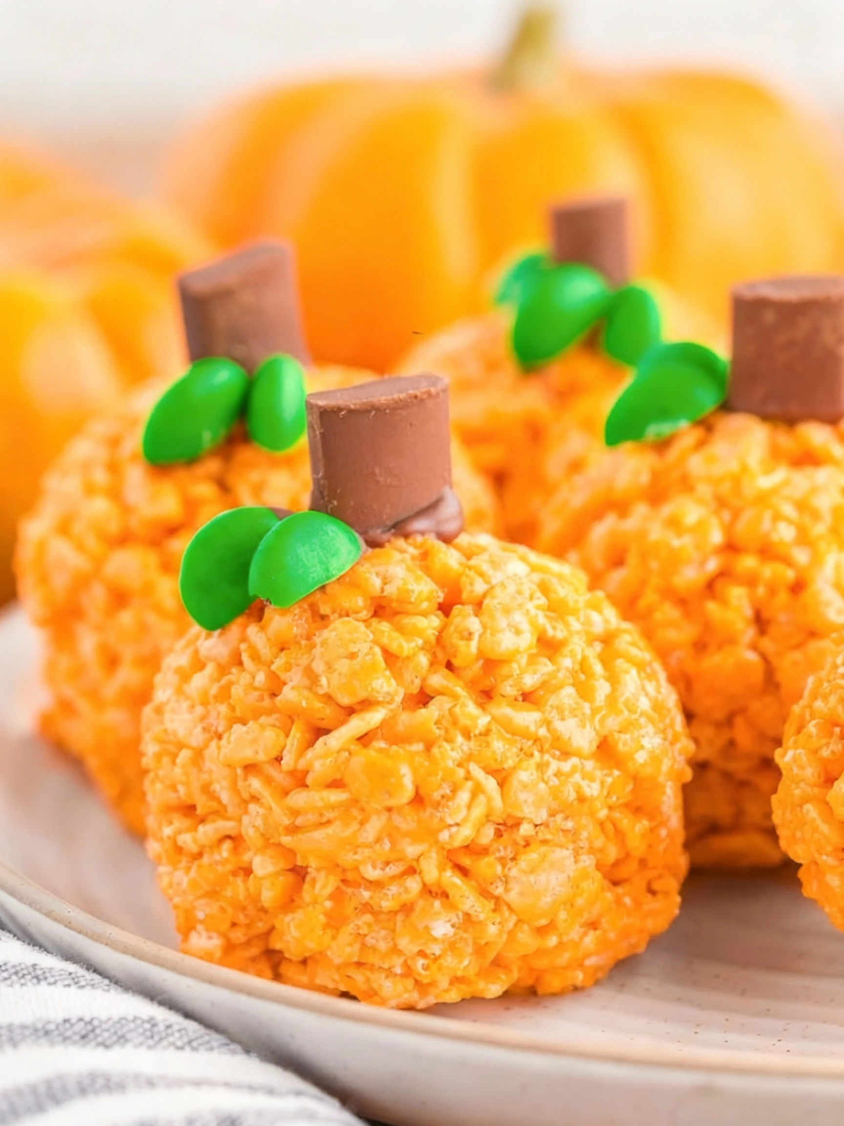 These Pumpkin Rice Krispie Treats are soft, sweet and so easy to make A spooktacular no-bake treat The cutest Halloween dessert finished