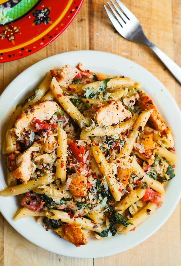 Chicken and Bacon Pasta with Spinach and Tomatoes in Garlic Cream Sauce finished