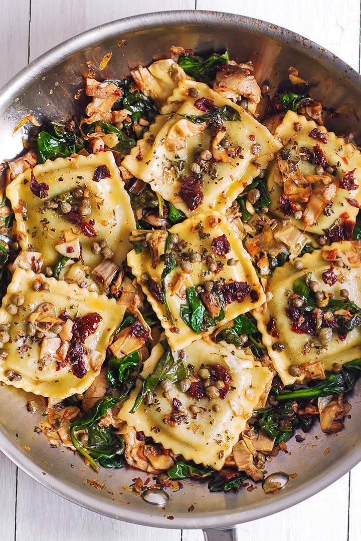 Italian Ravioli With Spinach Artichokes Capers Sun Dried Tomatoes Recipe