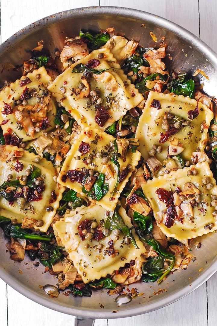 Italian Ravioli with Spinach, Artichokes, Capers, Sun-Dried Tomatoes finished