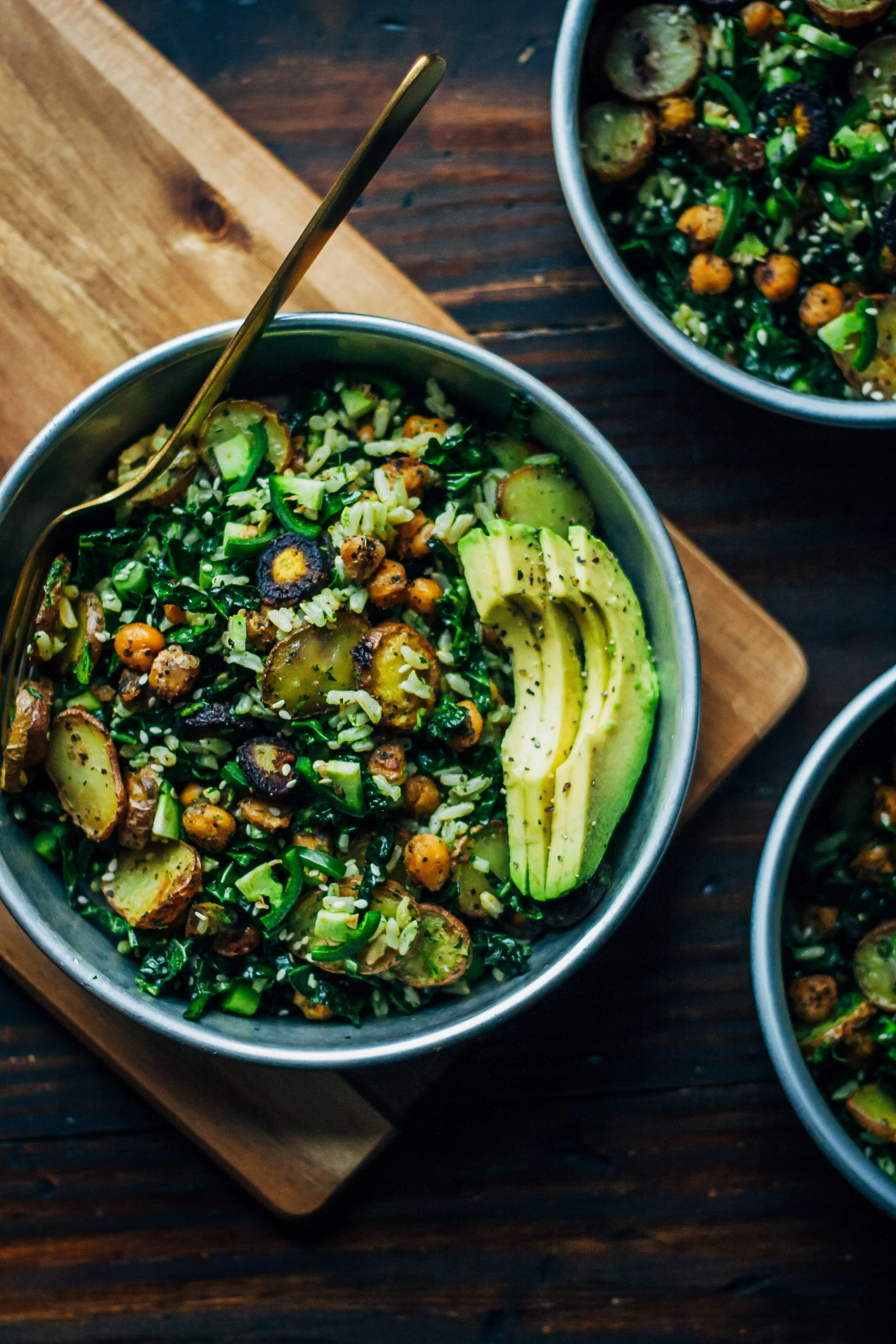Kale Detox Salad or Easy vegan kale detox salad with chickpeas, pesto rice, potatoes, and avocado finished