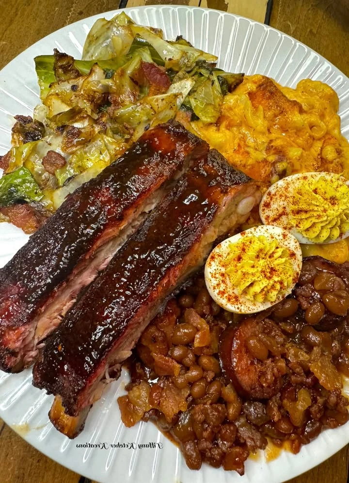 Smoked ribs, baked mac, cowboy beans, fried cabbage and deviled eggs finished
