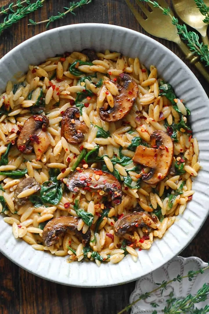 Spinach and Mushroom Orzo in a Creamy Garlic and Smoked Parika Sauce. 30 MINUTE ONE-PAN MEATLESS MAIN or SIDE DISH. finished
