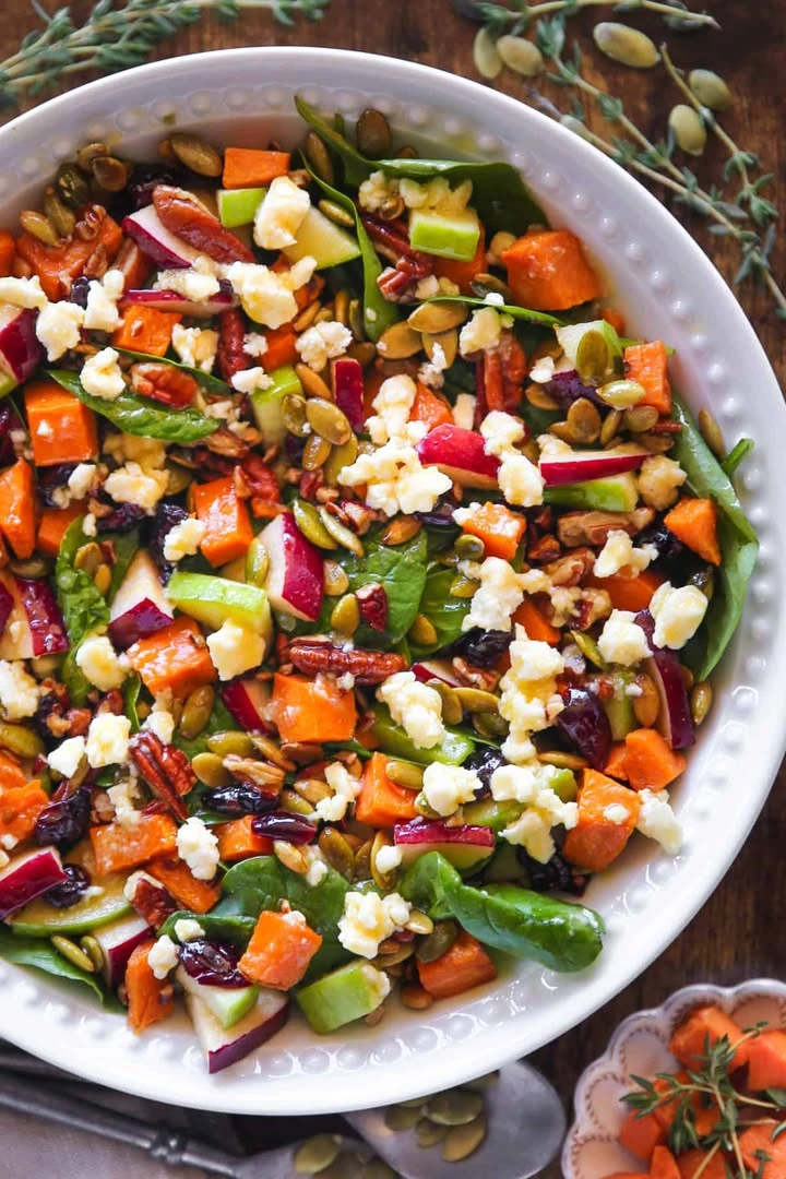 Winter Spinach Salad with Roasted Sweet Potatoes, Apples, Cranberries, Pecans, Pumpkin Seeds, Feta Cheese, and Maple-Lime Dressing finished